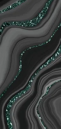 This live wallpaper features a digital rendering of a black and green marble inspired by the patterns of malachite