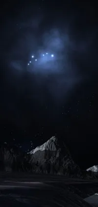 This phone live wallpaper showcases a beautiful, blue planet surrounded by a thin ring and a twinkling star in the background