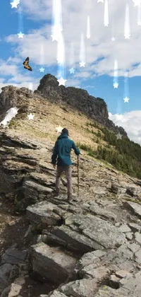 This live wallpaper features a hiker ascending a mountain in Glacier National Park