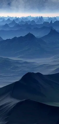 This phone live wallpaper boasts breathtaking aerial views of the mountains, an artistic matte painting mountain range, and Tumblr-inspired dark blue hues