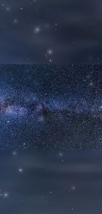 This phone live wallpaper showcases a stunning night sky filled with twinkling stars in panoramic widescreen view