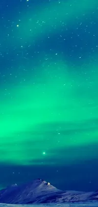 This phone live wallpaper features a variety of stunning visual designs including a skier on a snowy slope, a microscopic image, abstract digital art, northern lights in space, and a person meditating with a glowing aura