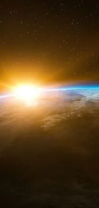 This live wallpaper displays a breathtaking view of the sunrise over our planet, accentuating the beauty of light and space through an artistic creation