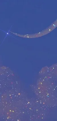 This live phone wallpaper features a stunning night sky with a glowing crescent moon and twinkling stars painted with a pointillism technique for a unique and artistic look