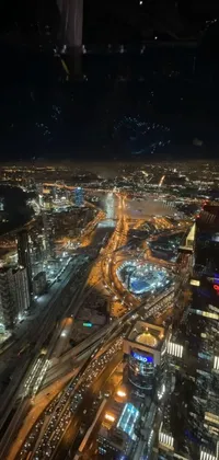 Transform your phone screen with a stunning live wallpaper featuring an aerial view of a bustling city at night