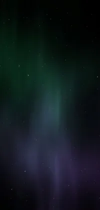 This stunning phone live wallpaper captures the beauty of aurora borealis in green and purple tones against a smoky, dark background