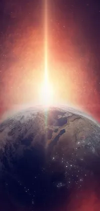 This phone live wallpaper showcases a breathtaking view of the sunrise over planet Earth