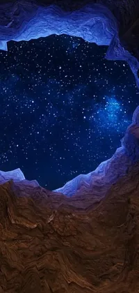 Experience the beauty of an unspoiled night sky as you look out from inside a clay cave with this digital phone live wallpaper