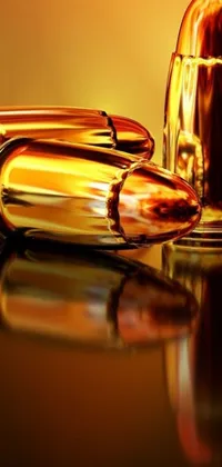 This live wallpaper for mobile phones features a close-up of a bullet on a reflective gold plate with vibrant vials and weapons in the background