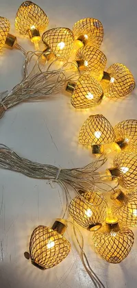 Bring a cozy and inviting ambiance to your smartphone with this live wallpaper of a close-up string of lights
