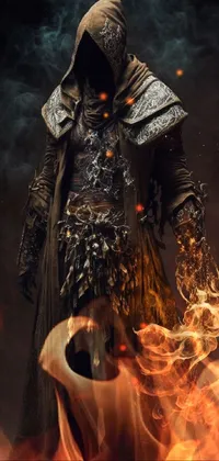 This phone live wallpaper showcases a digital portrait of a hooded man holding a bright fire in his hand