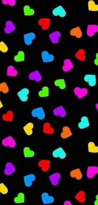 Looking for a lively live wallpaper for your phone? Check out this multi-colored heart design on a cool black background