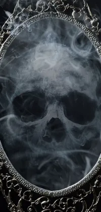This live wallpaper features a skull in a mirror emitting smoke, perfect for lovers of dark fantasy
