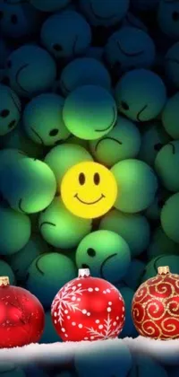 This festive live wallpaper for mobile phones features a bright smiley face surrounded by colorful Christmas ornaments
