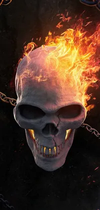 Decorate your phone with an eye-catching Skull Live Wallpaper featuring blazing hot flames erupting from its mouth