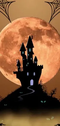 This captivating live phone wallpaper showcases an enchanting digital art image of a castle perched atop of a hill, illuminated by the luminous glow of a full moon, with a festive jack-o'-lantern adding a touch of Halloween spirit