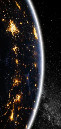Looking for an out-of-this-world phone live wallpaper? Look no further than this stunning view of Earth from space at night! With amazing digital art and a galaxy in the distance, it's a discovered photo that is both coherent and absolutely breathtaking