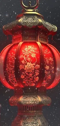 This live phone wallpaper features a stunning red lantern perched atop a snowy ground amidst a black background