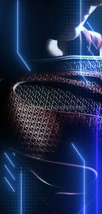 This live wallpaper for your phone features an image from the Man of Steel movie poster, showcasing a close-up shot of the superhero in his iconic bodysuit and red cape
