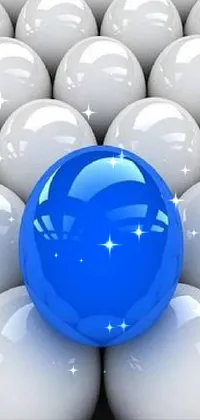 Looking for a blue and white live wallpaper for your phone that's sure to impress? Check out this stunning design featuring a blue ball among a group of white balls on an eggshell color background