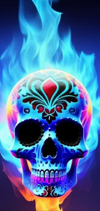 This live wallpaper features a detailed digital artwork of a skull on fire with a blue background
