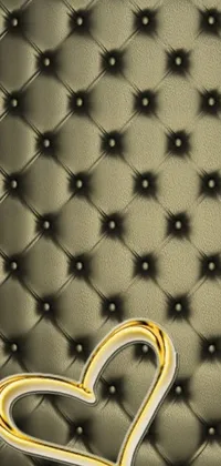 This stunning live wallpaper features a gold heart on a black leather background with a baroque style