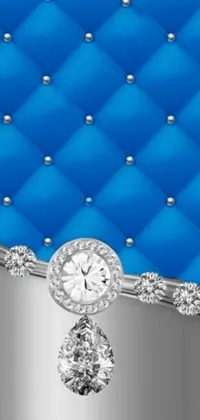 This stunning live wallpaper features a blue and diamond background with silver accessories