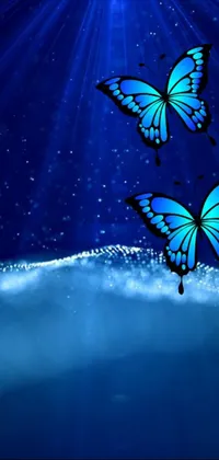 This phone live wallpaper depicts two blue butterflies gracefully flying over a sparkling body of water, in stunning digital art