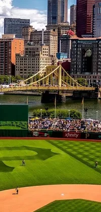 Looking to add some excitement to your phone's display? Look no further than this live wallpaper featuring a bustling baseball field with a vibrant city skyline in the background