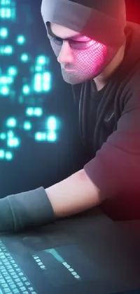 This phone live wallpaper features a mysterious man wearing an anonymous mask, focused on hacking into a mainframe through his laptop computer