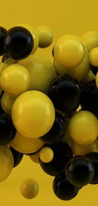 This live wallpaper features a vibrant and dynamic design with black and yellow balloons and floating shapes