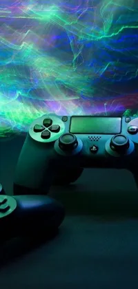 This phone live wallpaper features a digital art style pair of gaming controllers