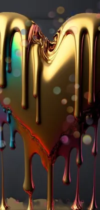 This live phone wallpaper features a stunning gold heart sitting on a table and covered in liquid