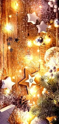 This stunning phone live wallpaper showcases a festive Christmas tree up close, complete with twinkling lights and a beautiful selection of wooden ornaments