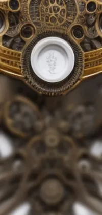 This phone live wallpaper showcases a close-up of a highly detailed clock on the wall, revealing intricate machinery and kinetic mechanics at work