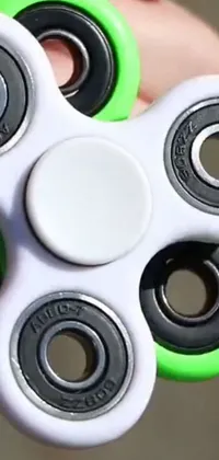 Transform your phone with a mesmerizing live wallpaper featuring a fidget spinner