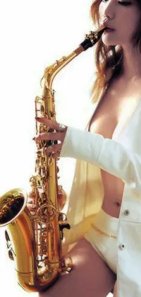 This phone live wallpaper features a woman in a white dress playing the saxophone