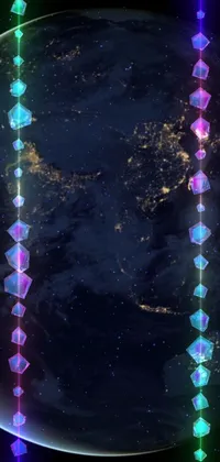 Looking for a futuristic and breathtaking live wallpaper for your phone? Look no further than this amazing view of the earth from space at night