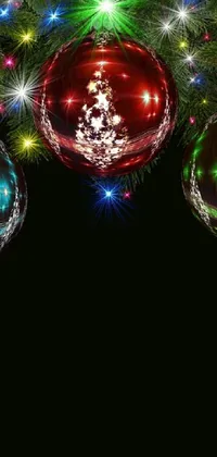 This stunning phone live wallpaper features a vibrant image of Christmas ornaments hanging from a tree