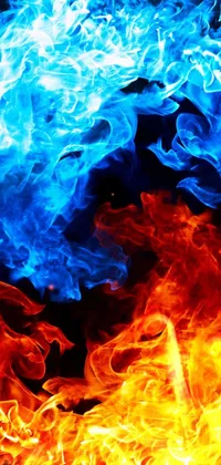 Looking for a mesmerizing phone live wallpaper? Check out this stunning digital rendering featuring a close up of a fiery blue and orange blaze on a black background