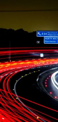 This highway live wallpaper offers a thrilling scene of traffic at night illuminated by breathtaking light painting effects