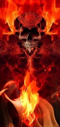 The digital live wallpaper for phones features a striking image of a skull ablaze on a black background