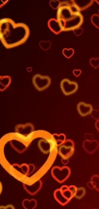 This stunning live wallpaper showcases a captivating display of bright red and yellow hearts set against a deep black background