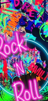 This phone live wallpaper features a bold neon sign that says "rock n roll" and an album cover