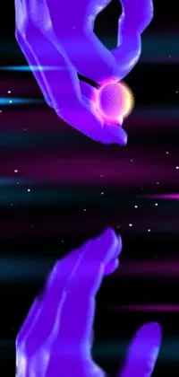 This phone live wallpaper showcases a hologram of two hands touching against a backdrop of vivid violet-colored planet and space art