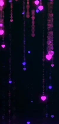 This phone live wallpaper showcases a picturesque display of hearts hanging from the ceiling