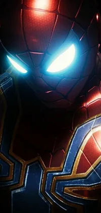 If you love Spider-Man, you'll love this live wallpaper! Featuring the iconic Spidey suit with glowing eyes, set against a dark background with a bold splash of red and blue, this wallpaper is the perfect way to show your favorite superhero some love