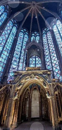 This stunning phone live wallpaper features a beautiful cathedral interior complete with stunning stained glass windows, an impressive Eiffel Tower photography and an ancient altar at its center