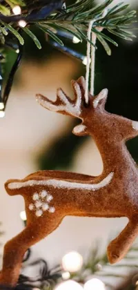This phone live wallpaper showcases a close-up view of a festive Christmas ornament
