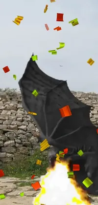 This phone live wallpaper features a flying bat set against a dark background